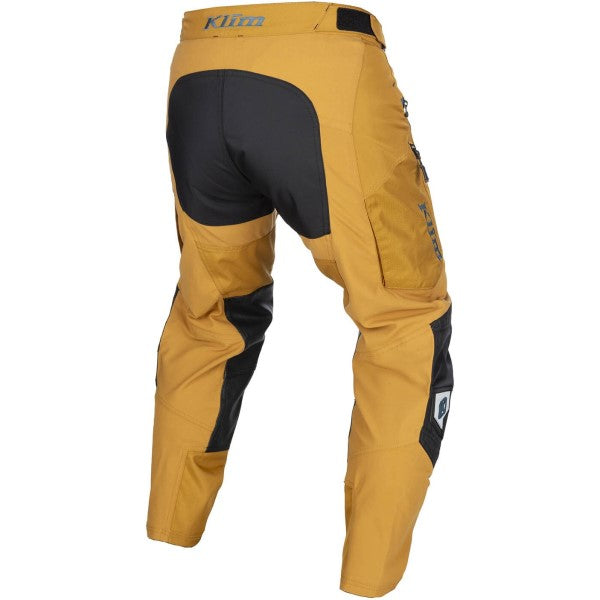 Pantalon de Motocross Dans la Botte Dakar Or incliné de dos