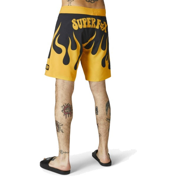 Short de Surf Supr Trik Noir/Jaune incliné de dos à droite